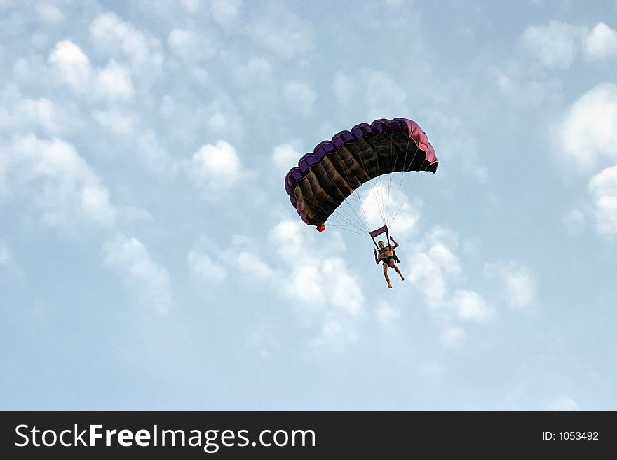 A lonely parachutist in the sky