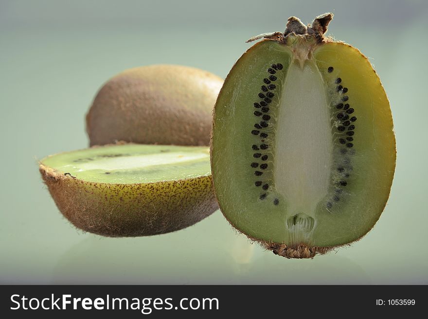 Kiwis on a glass table