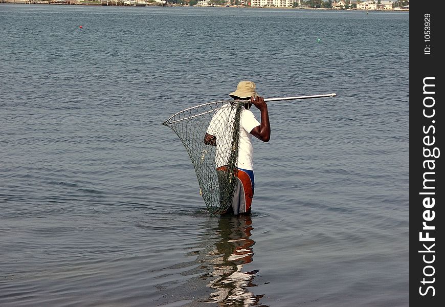 Man Fishing for Crabs
