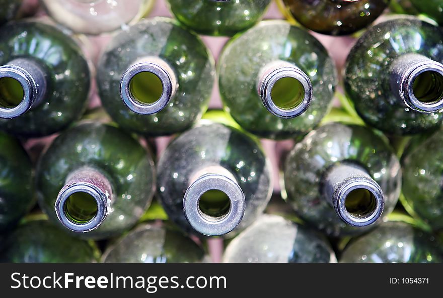 Stack of old green bottles