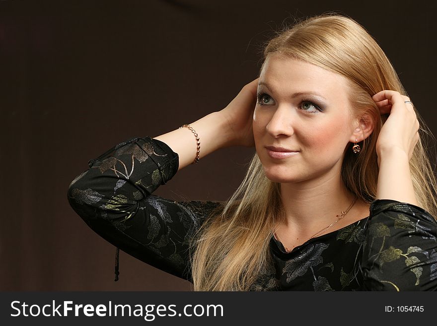 Young woman on dark background. Young woman on dark background