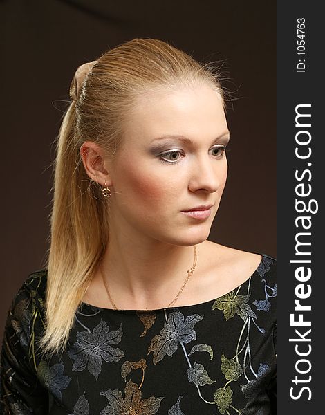 Young woman on dark background. Young woman on dark background