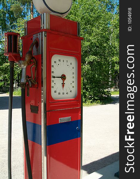 Old style, red and blue gasoline pump. Old style, red and blue gasoline pump
