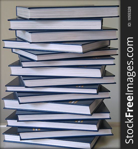 Stack of blue encyclopedias with white background. Stack of blue encyclopedias with white background.