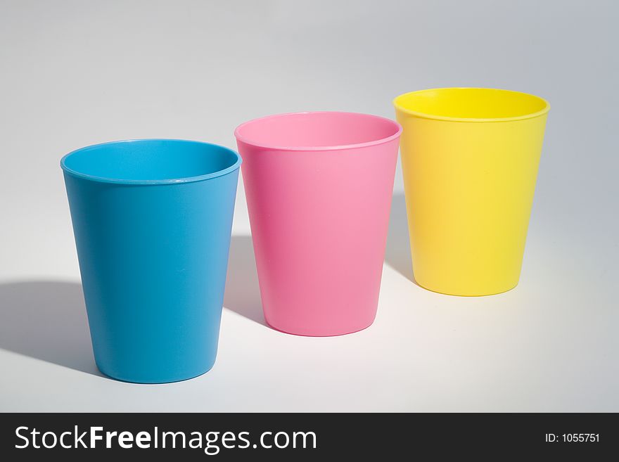 THree cups in the colors Yellow, Magenta and Cyan. Black is missing. THree cups in the colors Yellow, Magenta and Cyan. Black is missing.