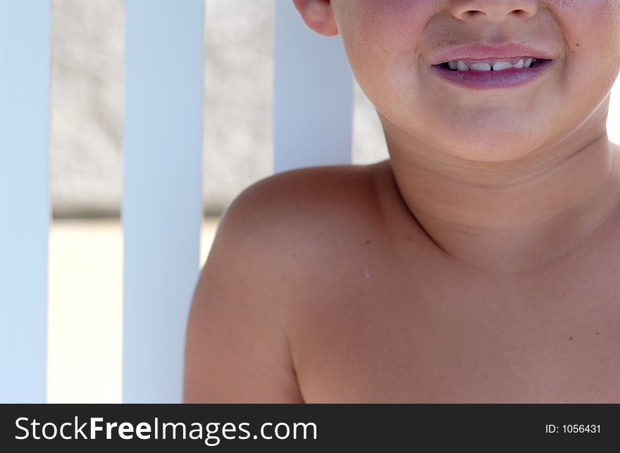 Boy on a porch swing