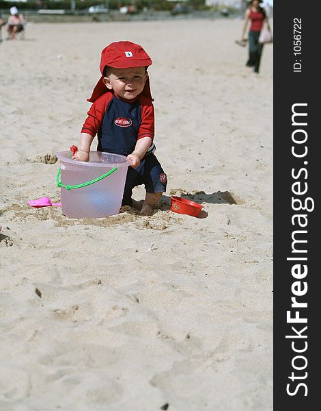 Small child exploring a beach in Cornwall. Small child exploring a beach in Cornwall.