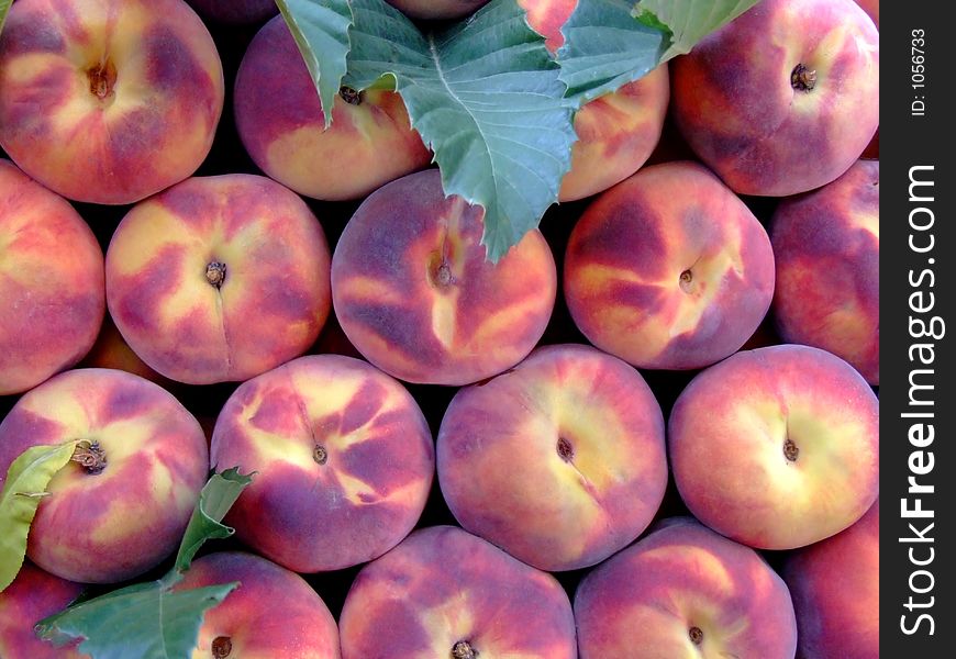 Bunch of peaches on an open market. Bunch of peaches on an open market