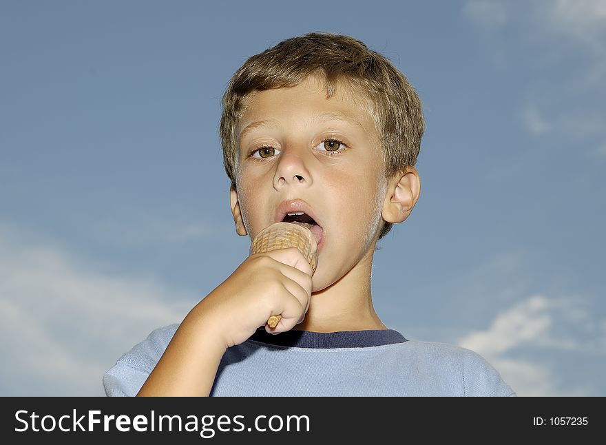 Young Boy Eating a Ice Cream Cone