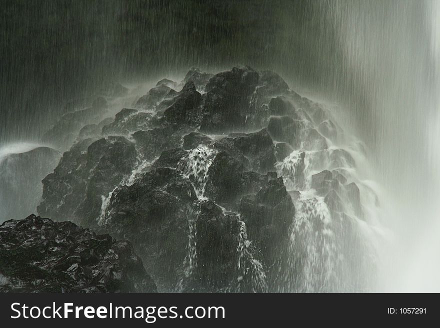 Rock under waterfall, Columbia Gorge, Oregon. Rock under waterfall, Columbia Gorge, Oregon