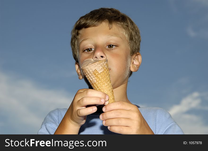 Young Boy Eating a Ice Cream Cone