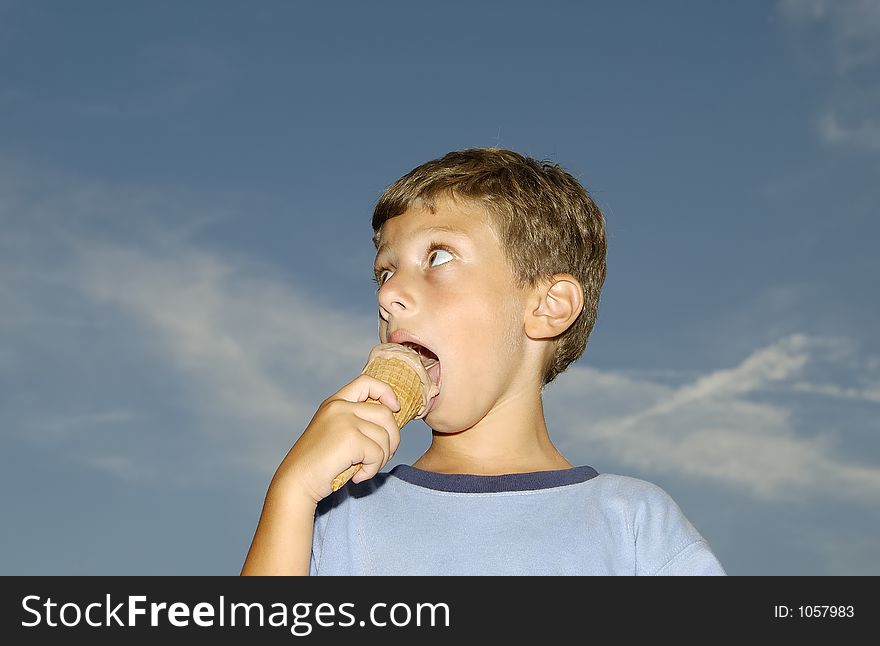 Young Boy Eating a Ice Cream Cone