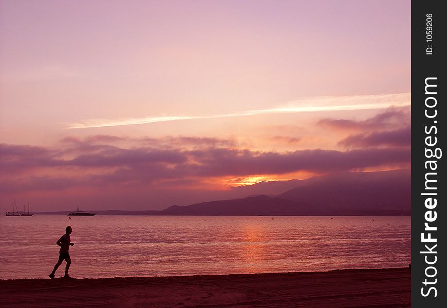 Corsica   bay of Calvi, at sunset. Corsica   bay of Calvi, at sunset