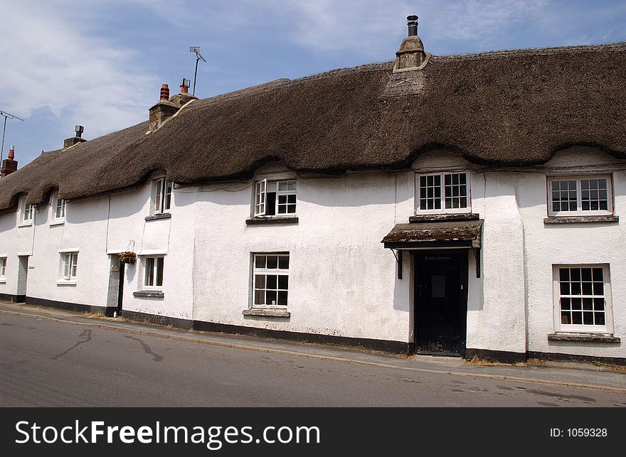 A Row of thatched cottages