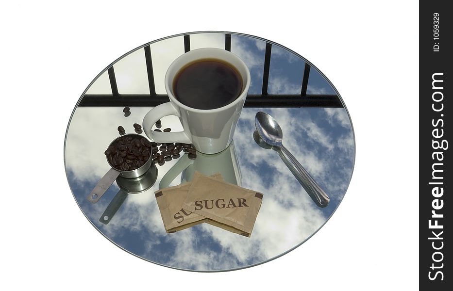 Mirror reflecting the sky with cup, spoon, sugar, coffee beans placed on top. Mirror reflecting the sky with cup, spoon, sugar, coffee beans placed on top
