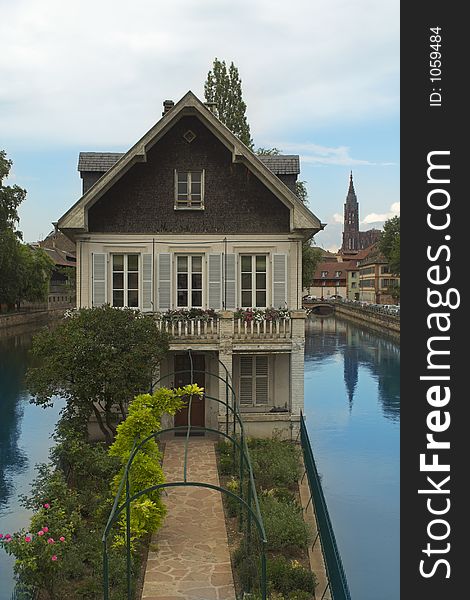 House in Strasbourg surounded by water