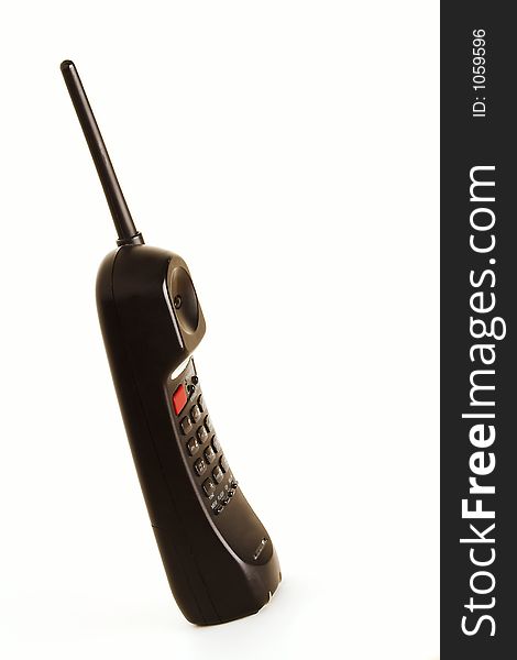 Black cordless phone handset on white