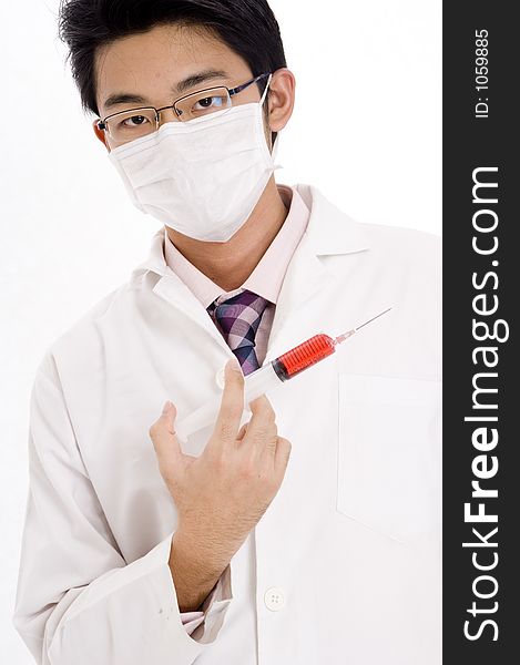 A young asian man in white coat holding lethal drug. A young asian man in white coat holding lethal drug