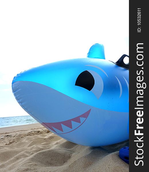 Large inflatable shark on Beach