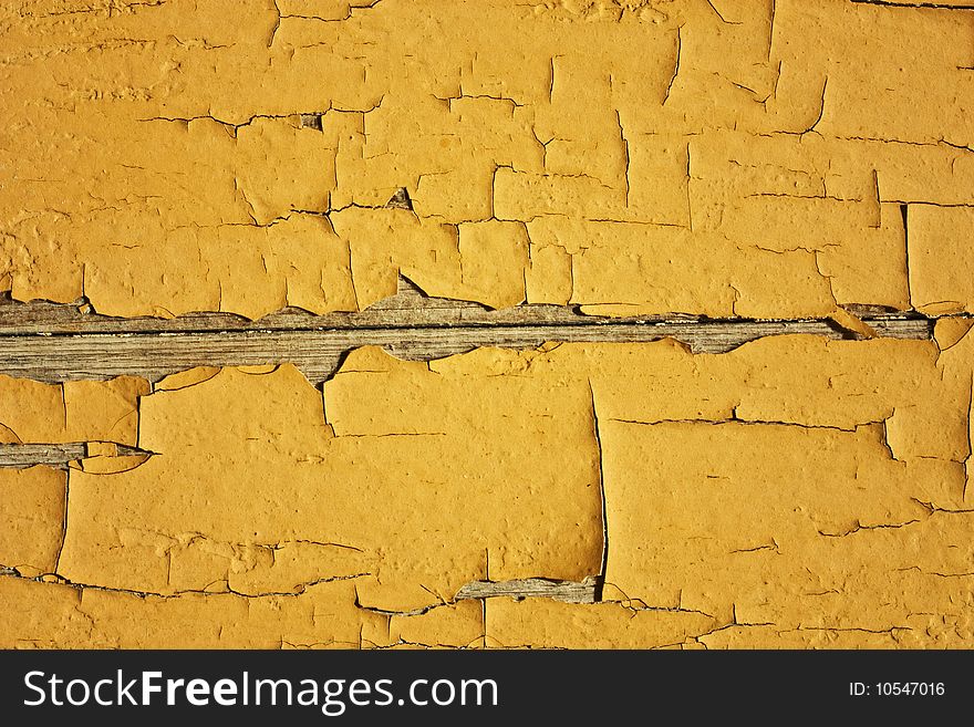 Crannied old paint on boards, macro