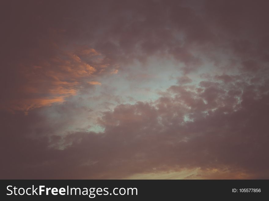 Summer sunset sky with clouds of red color, filtered background. Summer sunset sky with clouds of red color, filtered background.