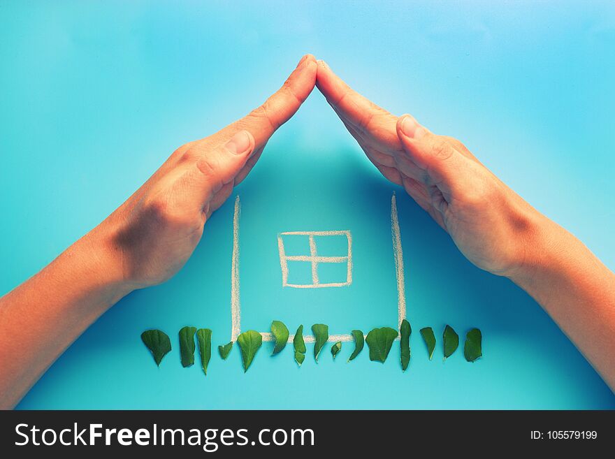 Sketch of a house with hands making a roof