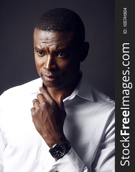 Photography Of Man In White Shirt With Round Black Analog Watch