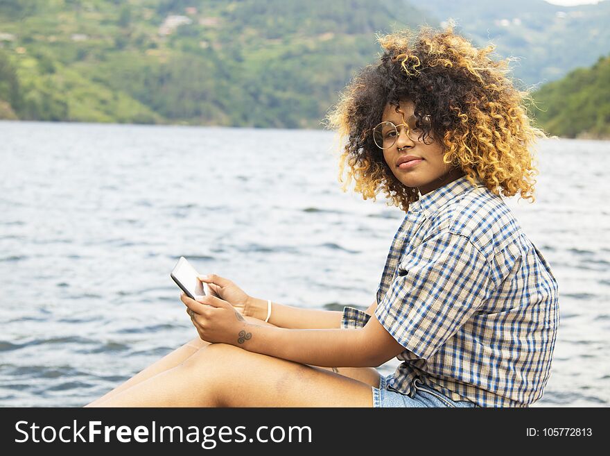 Girl with the tablet summer vacation