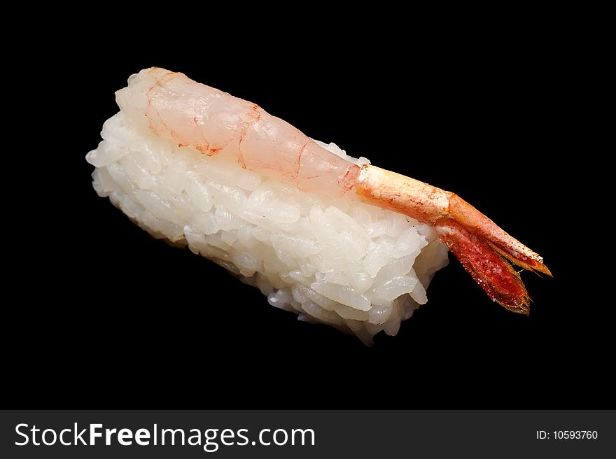 One cocktail shrimp nigiri-zushi (nigiri sushi) isolated on black