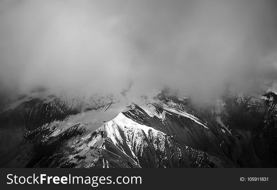 Snow Covered Mountain With Mist