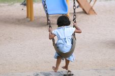 Little Girl Swinging At Park Royalty Free Stock Image Little Girl Swinging At Park Royalty Free Stock Image