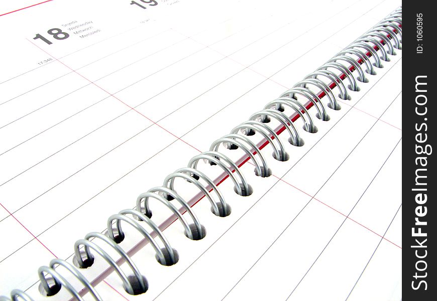 Notebook closeup macro with calendar