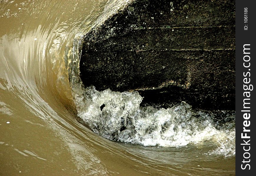 Broken water on the River Hers, south west France as it flows under a bridge after heavy rain. Broken water on the River Hers, south west France as it flows under a bridge after heavy rain