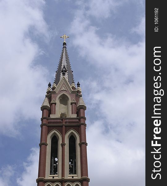 The steeple of a church. The steeple of a church