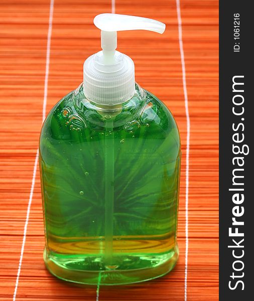 Green soap on orange