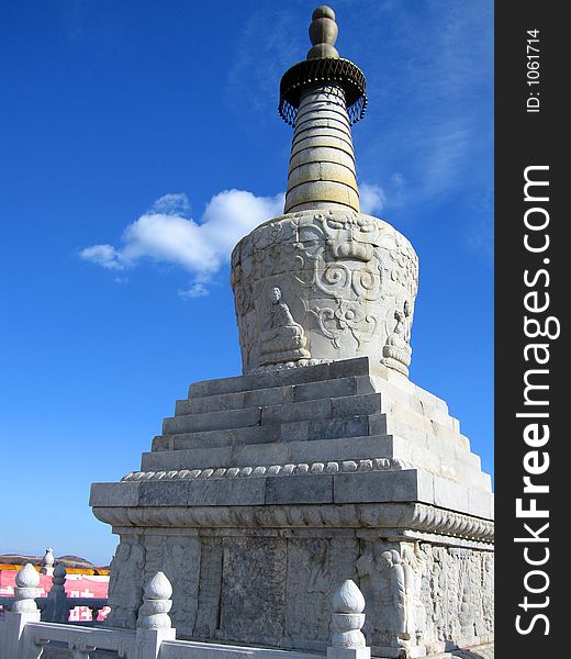 White tower in front of a temple, in china. White tower in front of a temple, in china