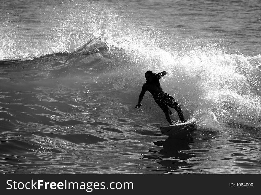 Surfer in the evening light, black and white. Surfer in the evening light, black and white