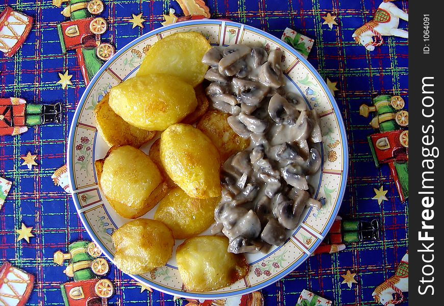 Mushrooms with potatoes on a traditional dish