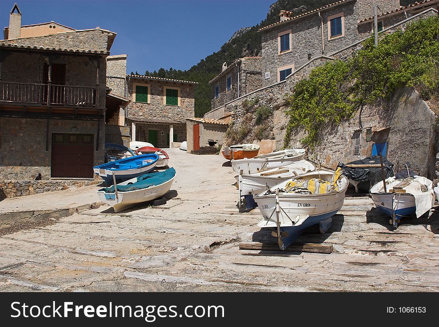 Fishing village with boats and slipway. Fishing village with boats and slipway