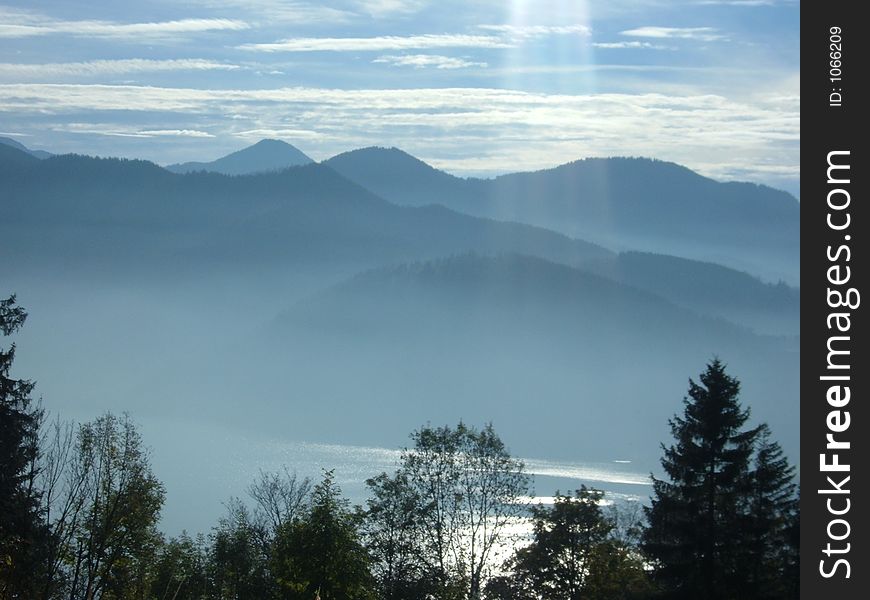 Schliersee, Bavaria, Germany with the misty Alps in the background. Schliersee, Bavaria, Germany with the misty Alps in the background