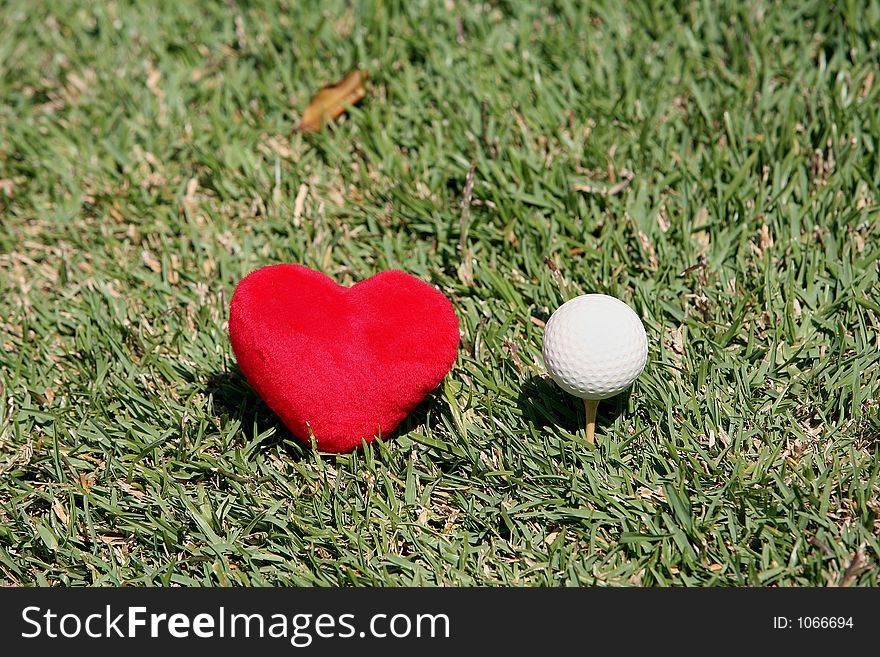 Golf ball and heart. Golf ball and heart