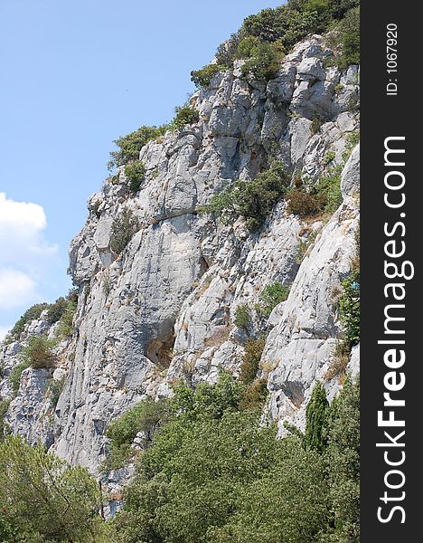 A cliff in the summer sky. A cliff in the summer sky