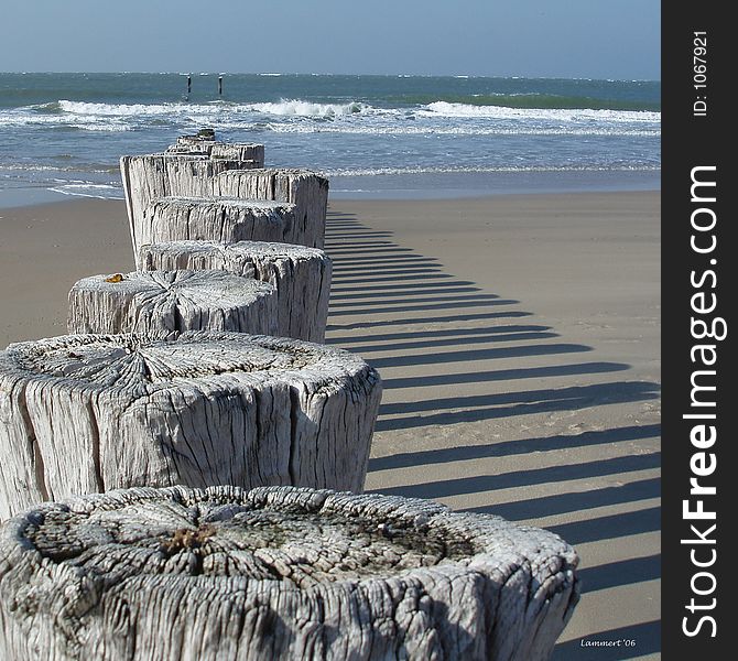 Poles on beach in windy weather