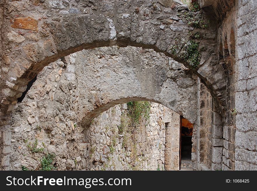 Perspective of two roman arches in a provencal village