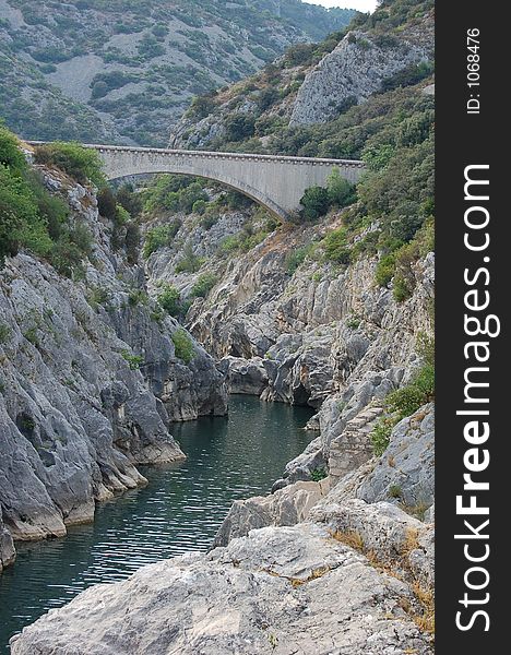 Water bridge over a small river down a canyon. Water bridge over a small river down a canyon