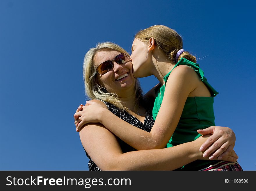 Girl Kissing Mother