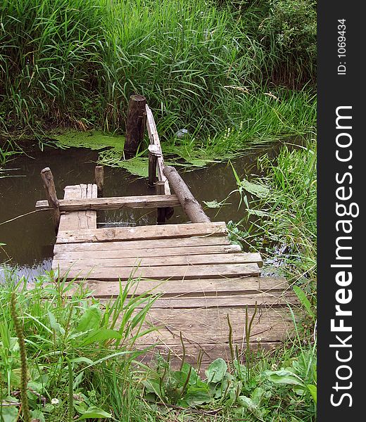 Old bridge on small river. Old bridge on small river