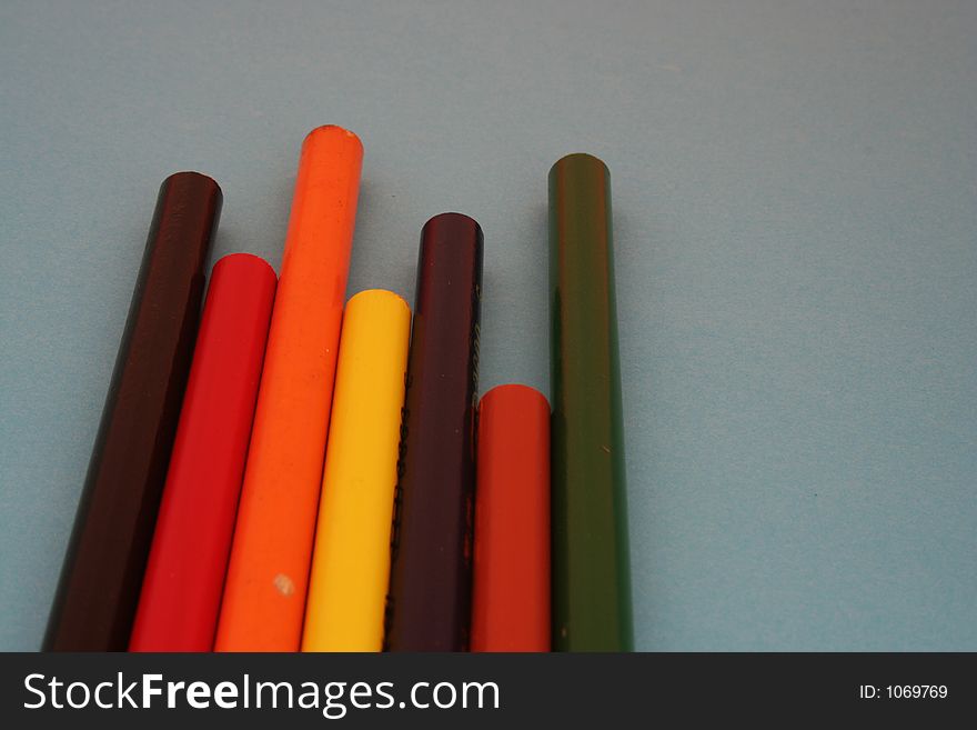 Row of colorful wooden  crayons