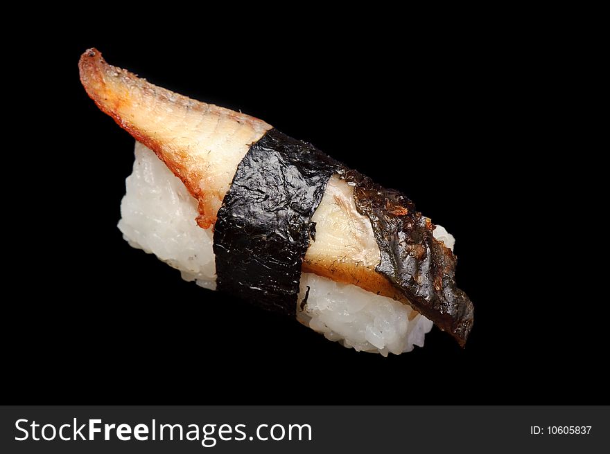Eel nigiri sushi, unagi or anago, isolated on black. Eel nigiri sushi, unagi or anago, isolated on black