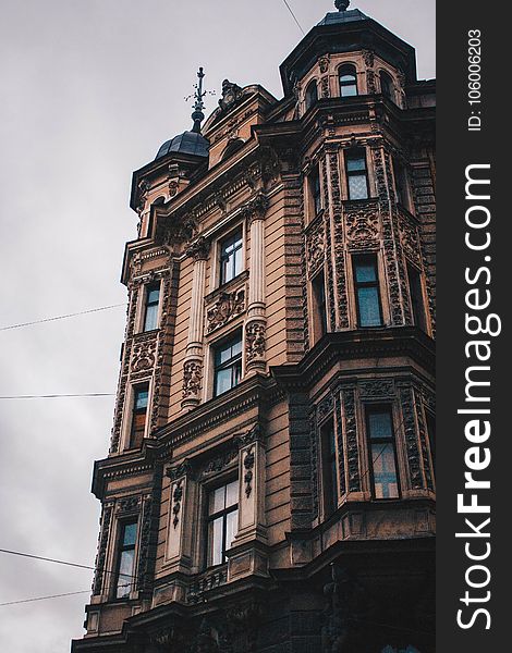 Brown Concrete Apartment Building